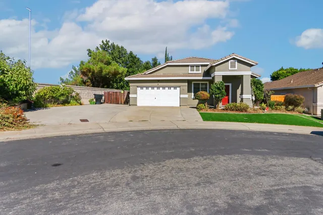 a view of house with outdoor space and street view