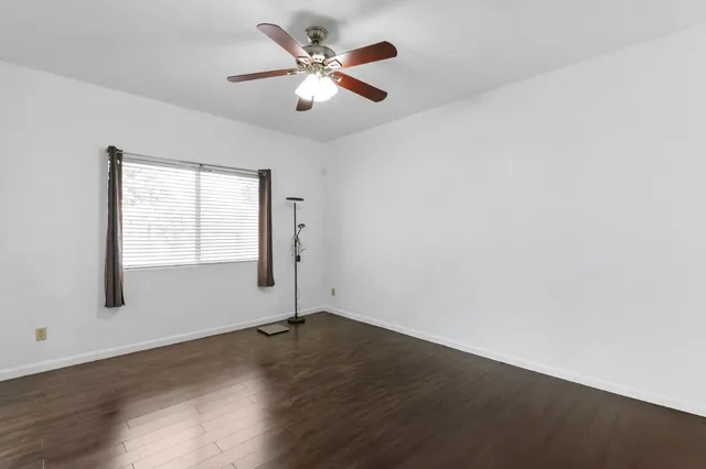 a bathroom with a shower sink vanity and mirror