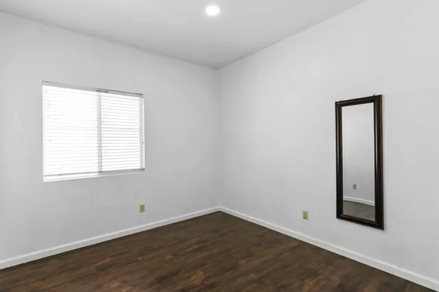 a backyard of a house with lots of green space