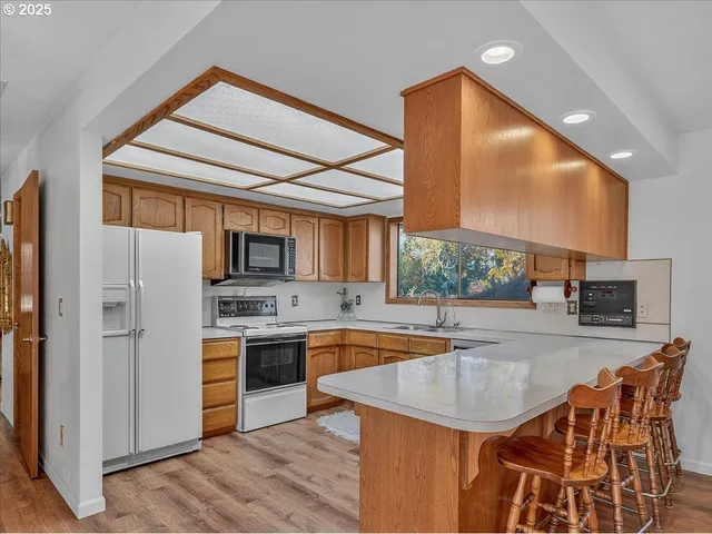 a kitchen with sink and window
