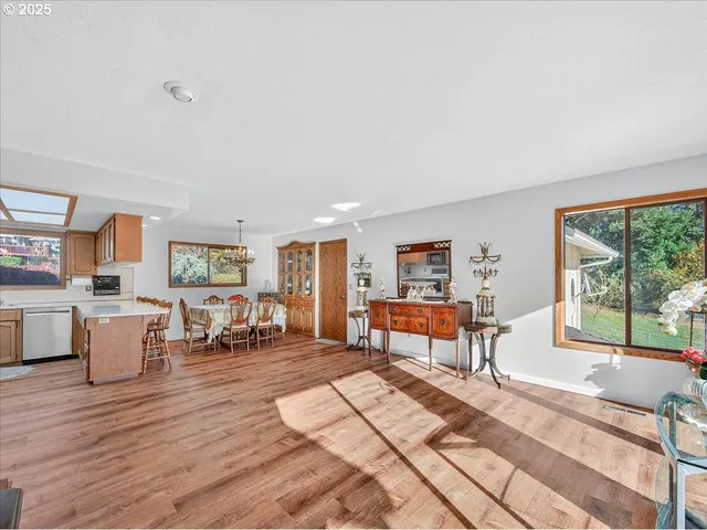 a bed room with a bed and a large window