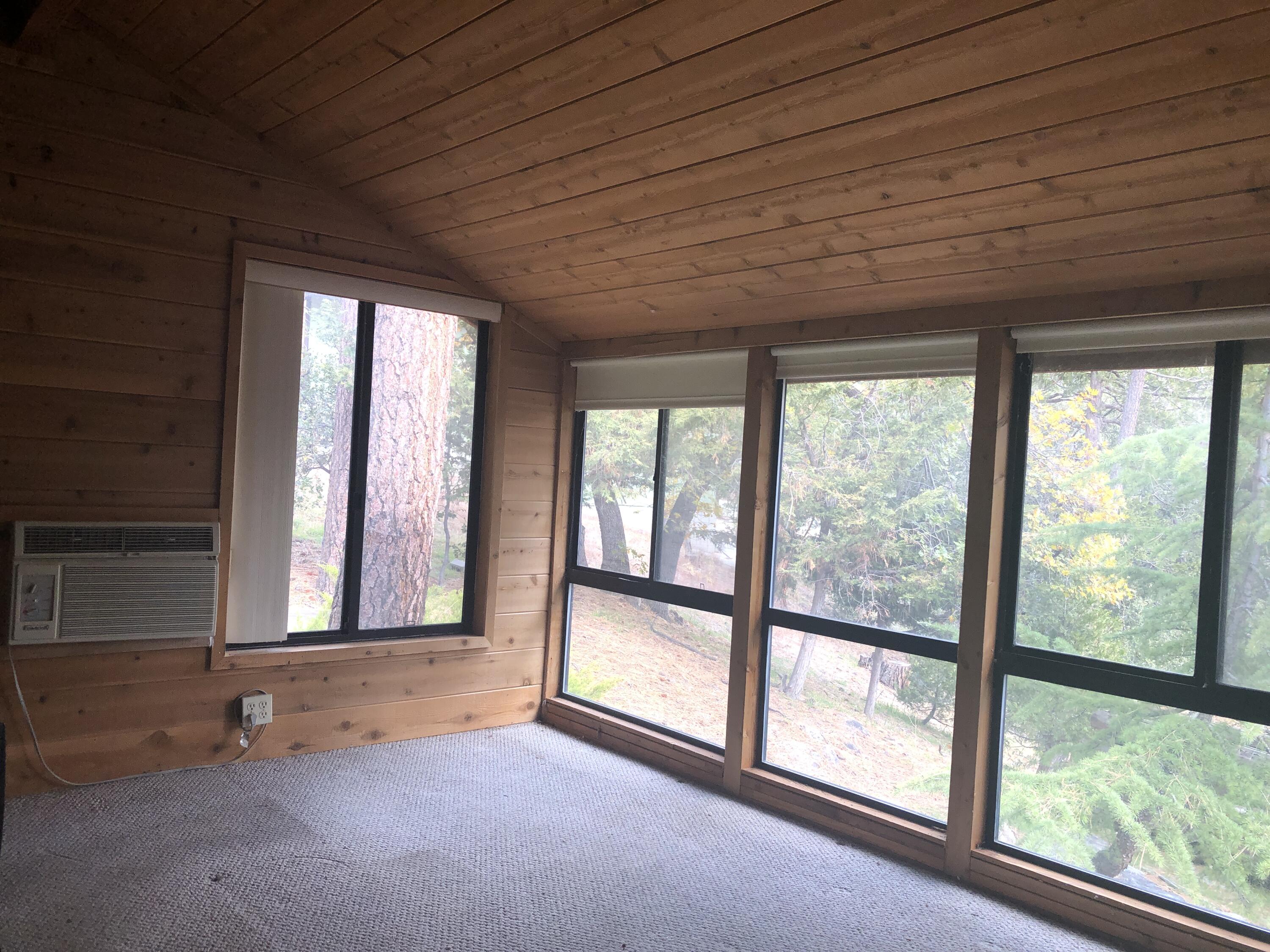 25360 Cedar Glen Drive Idyllwild, CA 92549 - Photo 28 of 47 a view of an empty room with a window