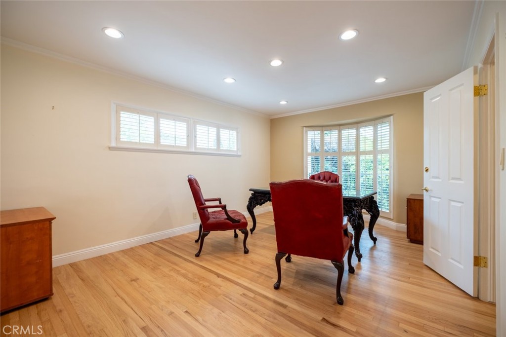 15363 Victory Boulevard Van Nuys, CA 91406 - Photo 16 of 52 a view of a dining room with furniture window and wooden floor