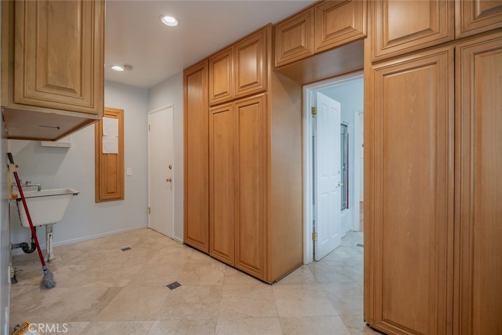 15363 Victory Boulevard Van Nuys, CA 91406 - Photo 24 of 52 a view of a hallway with closet area
