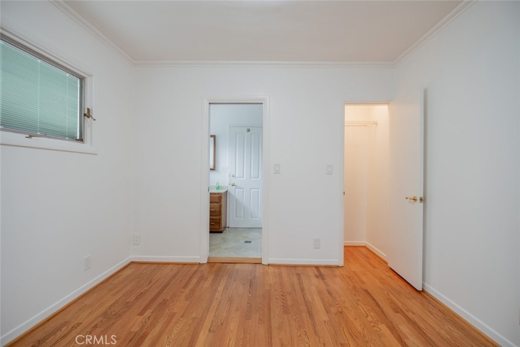 15363 Victory Boulevard Van Nuys, CA 91406 - Photo 27 of 52 a view of empty room with wooden floor