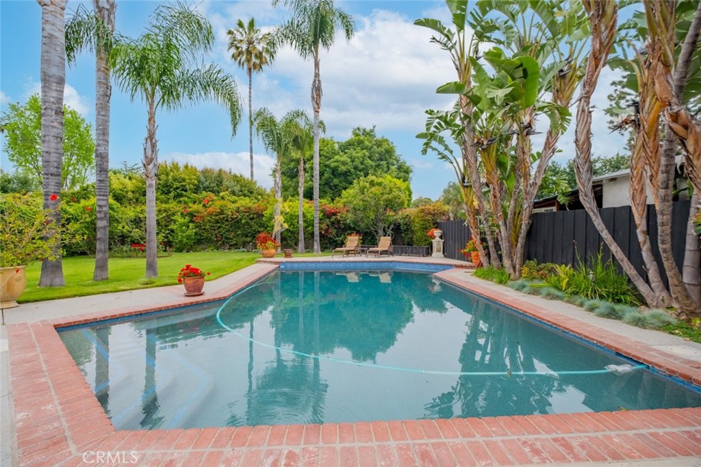 15363 Victory Boulevard Van Nuys, CA 91406 - Photo 44 of 52 a view of a swimming pool with a yard