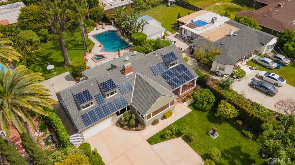 15363 Victory Boulevard Van Nuys, CA 91406 - Photo 50 of 52 an aerial view of residential house with outdoor space and parking