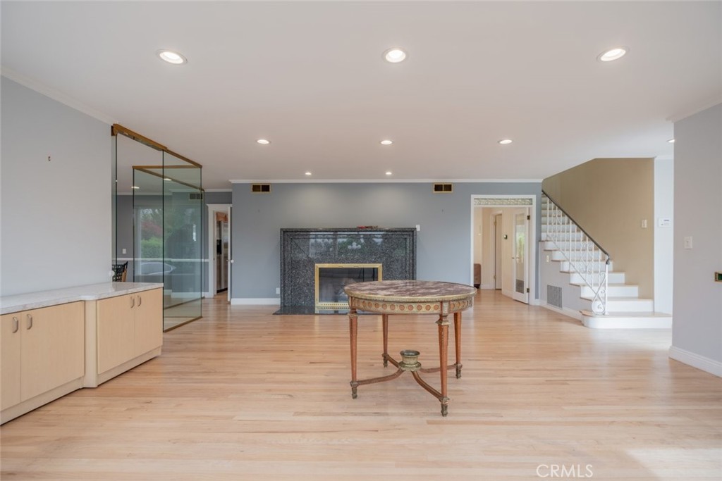 15363 Victory Boulevard Van Nuys, CA 91406 - Photo 6 of 52 a open kitchen with a table and chairs