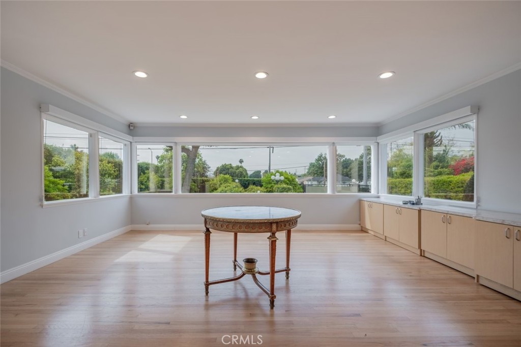 15363 Victory Boulevard Van Nuys, CA 91406 - Photo 7 of 52 a living room with furniture and a large window