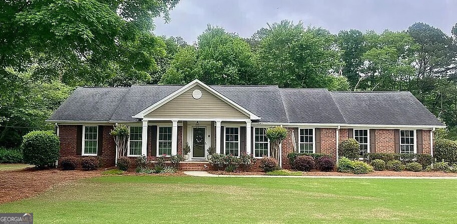 6 Fieldwood Road Rome, GA 30161 - Photo 1 of 1 a front view of a house with a yard