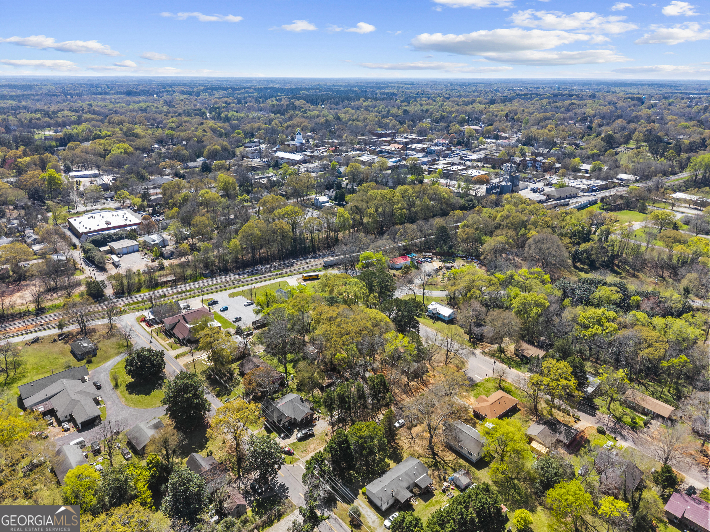 517 Gilmore Street Madison, GA 30650 - Photo 5 of 34 an aerial view of residential houses with outdoor space