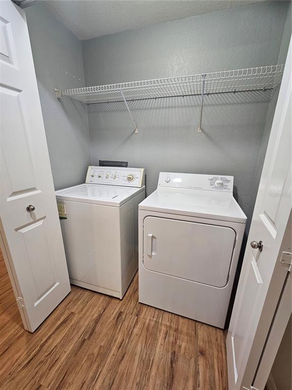 5174 Northridge Road, Unit 209 Sarasota, FL 34238 - Photo 15 of 25 a utility room with dryer and washer