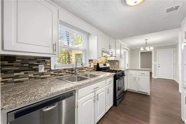 $549,000 | 4574 Woodland Circle Northeast, Roswell, GA 30075