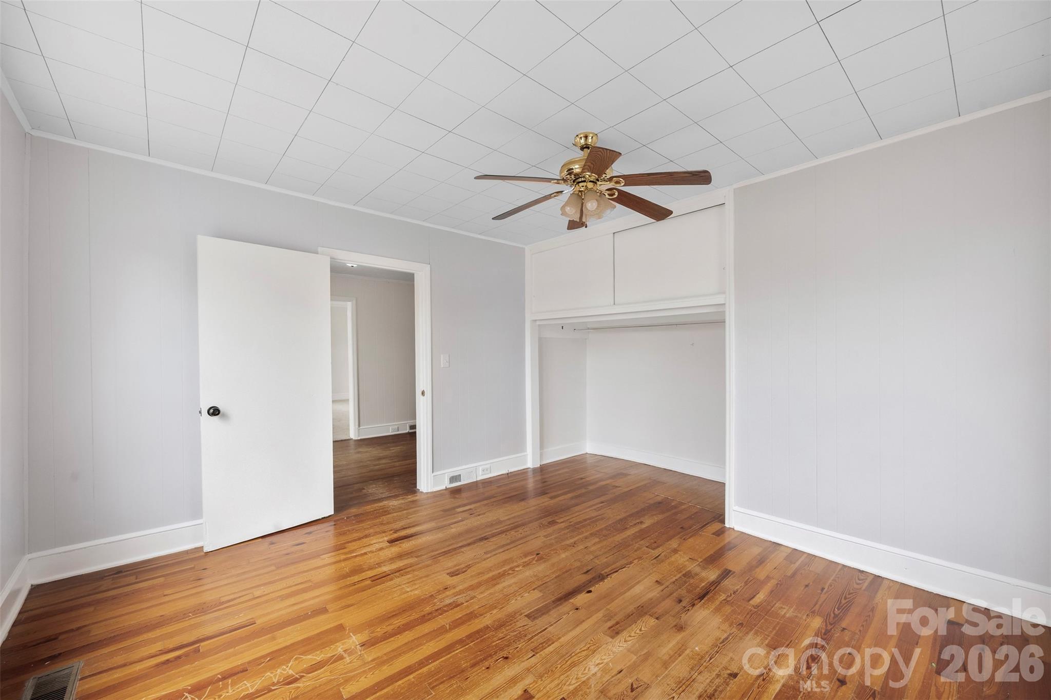 302 South Maple Street Dallas, NC 28034 - Photo 16 of 25 a view of empty room with wooden floor
