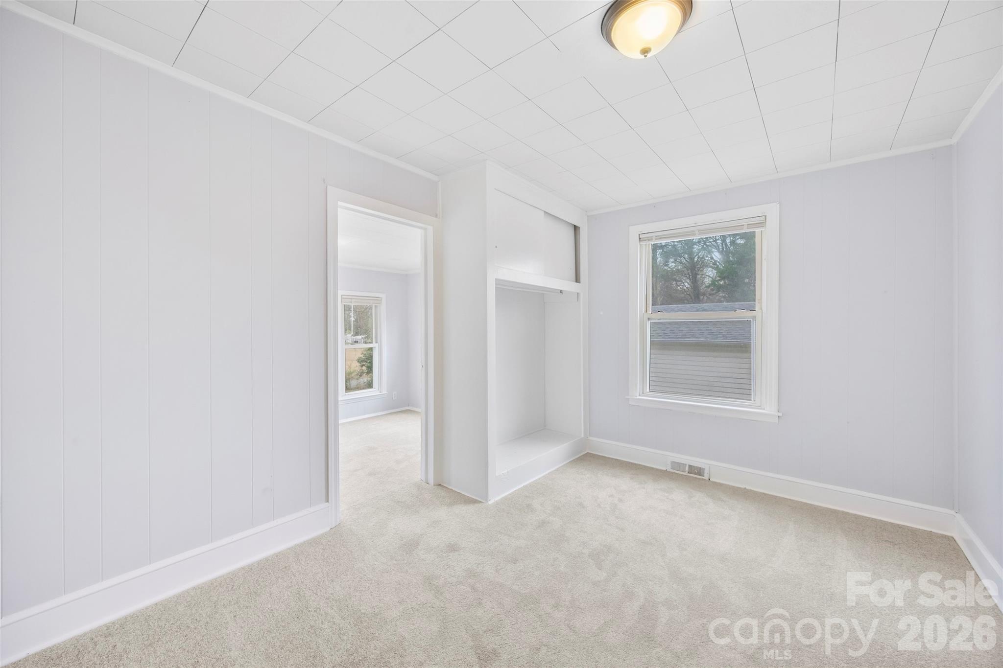 302 South Maple Street Dallas, NC 28034 - Photo 17 of 25 a view of an empty room with a window