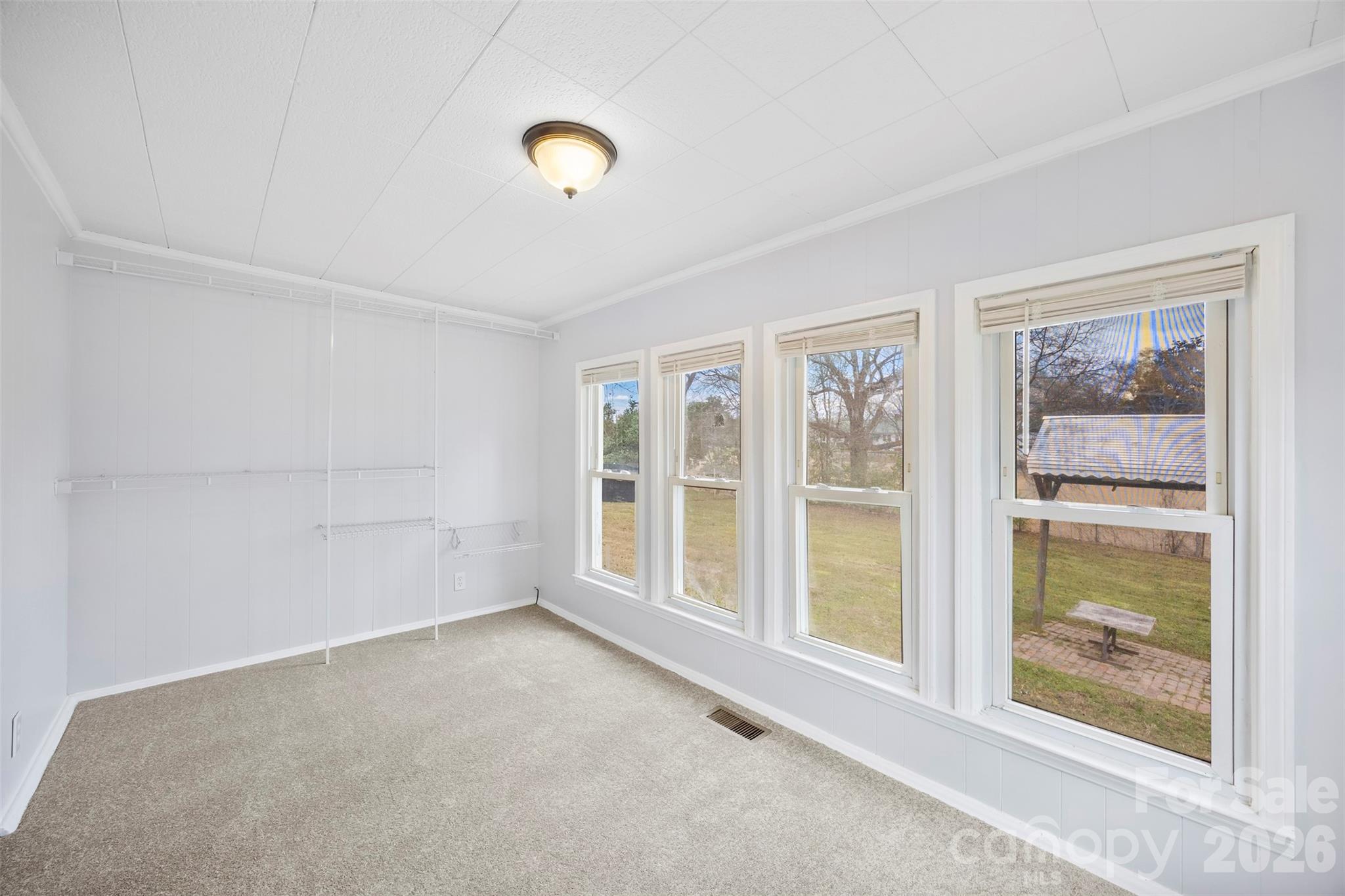 302 South Maple Street Dallas, NC 28034 - Photo 19 of 25 a view of an empty room with a window