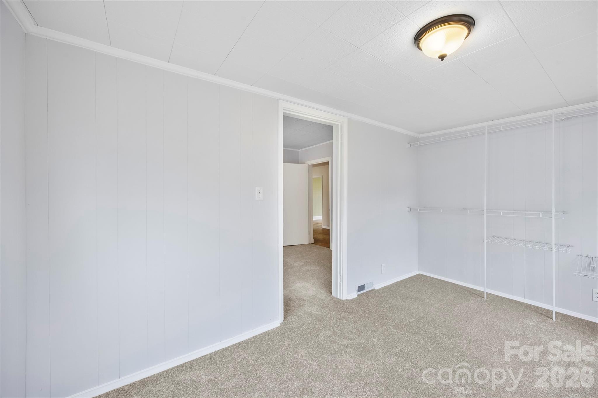 302 South Maple Street Dallas, NC 28034 - Photo 20 of 25 a view of an empty room with a window