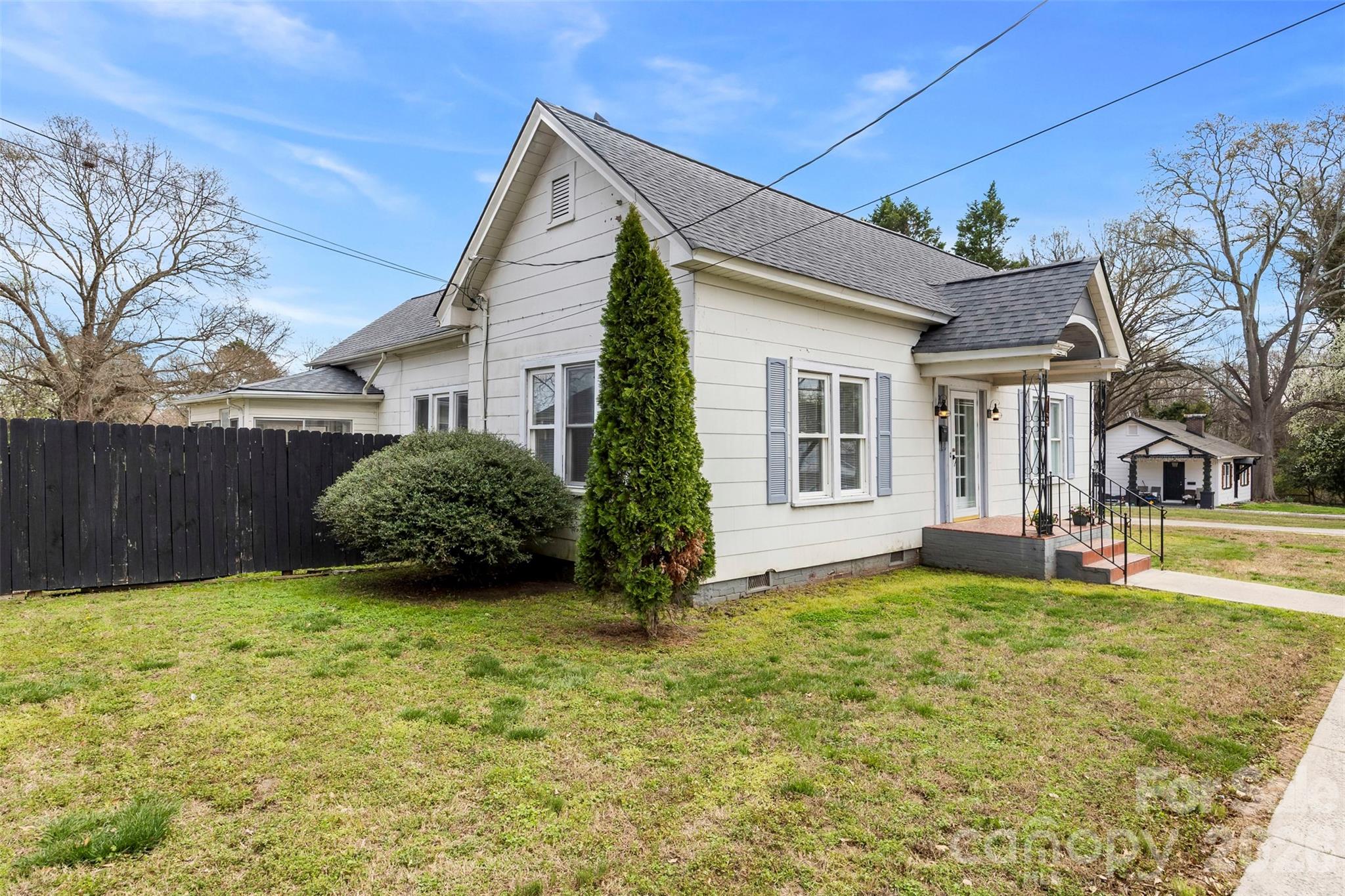 302 South Maple Street Dallas, NC 28034 - Photo 2 of 25 a view of a house with a yard
