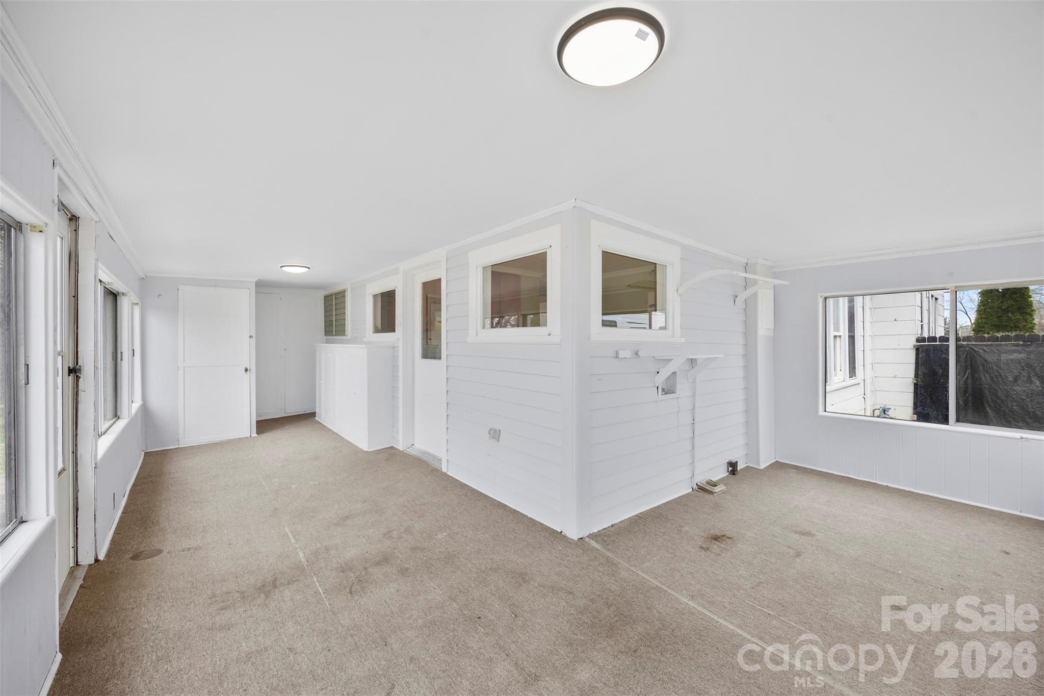 302 South Maple Street Dallas, NC 28034 - Photo 22 of 25 an empty room with windows