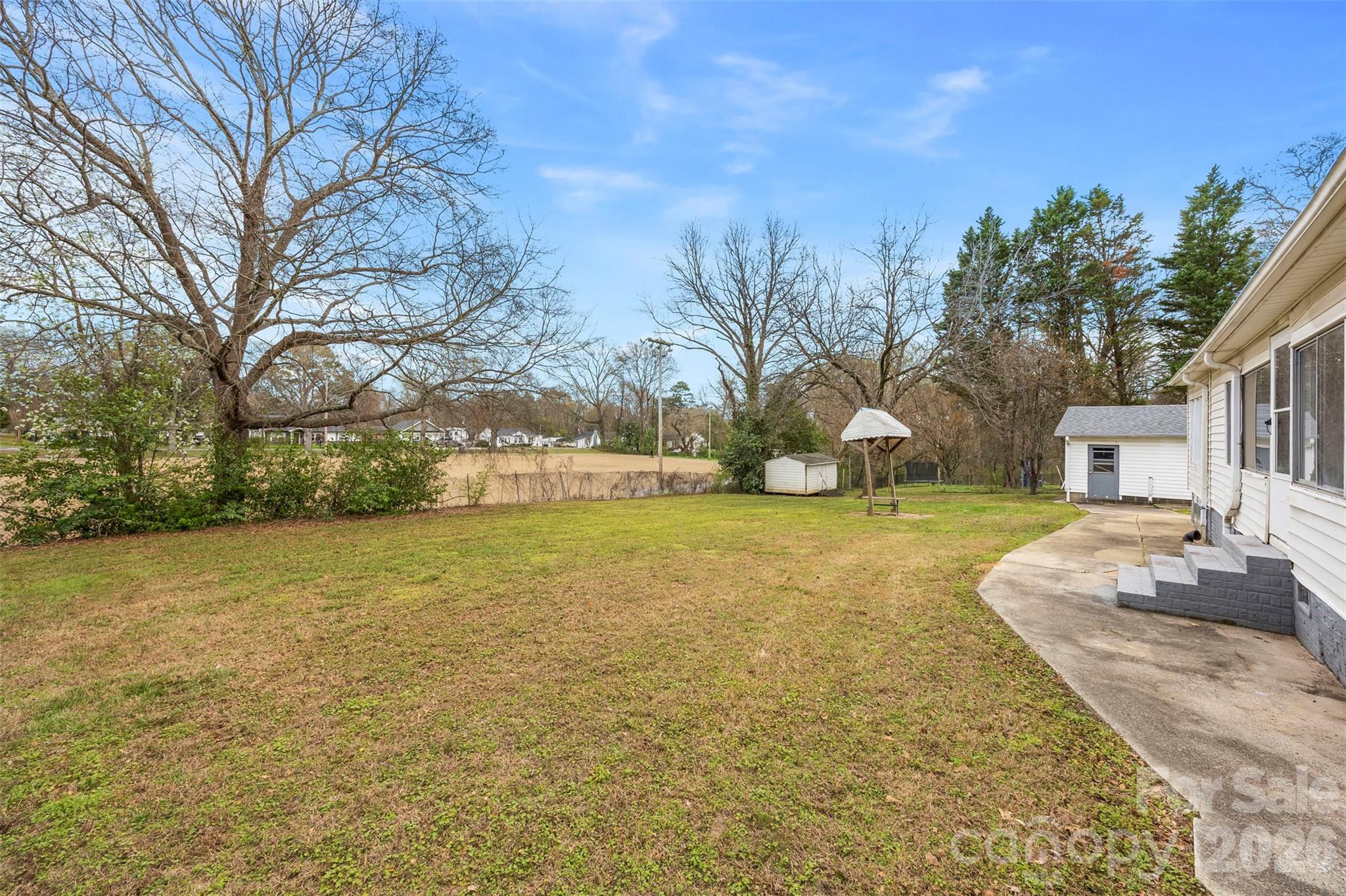302 South Maple Street Dallas, NC 28034 - Photo 24 of 25 a view of a house with a yard