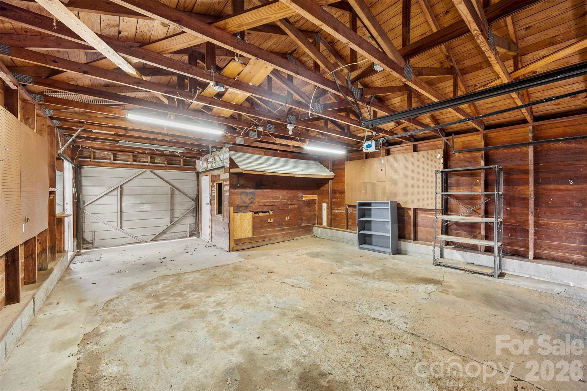 302 South Maple Street Dallas, NC 28034 - Photo 25 of 25 a view of a empty room with wooden ceiling