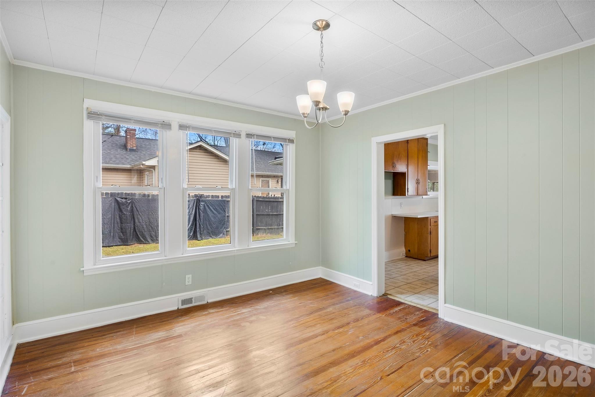 302 South Maple Street Dallas, NC 28034 - Photo 7 of 25 a view of an empty room with a window