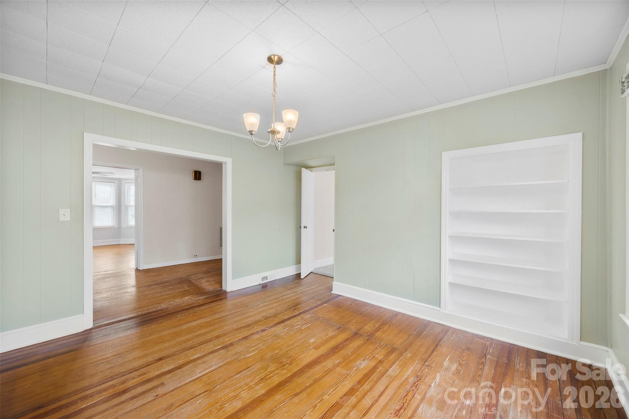 302 South Maple Street Dallas, NC 28034 - Photo 8 of 25 a view of empty room with wooden floor