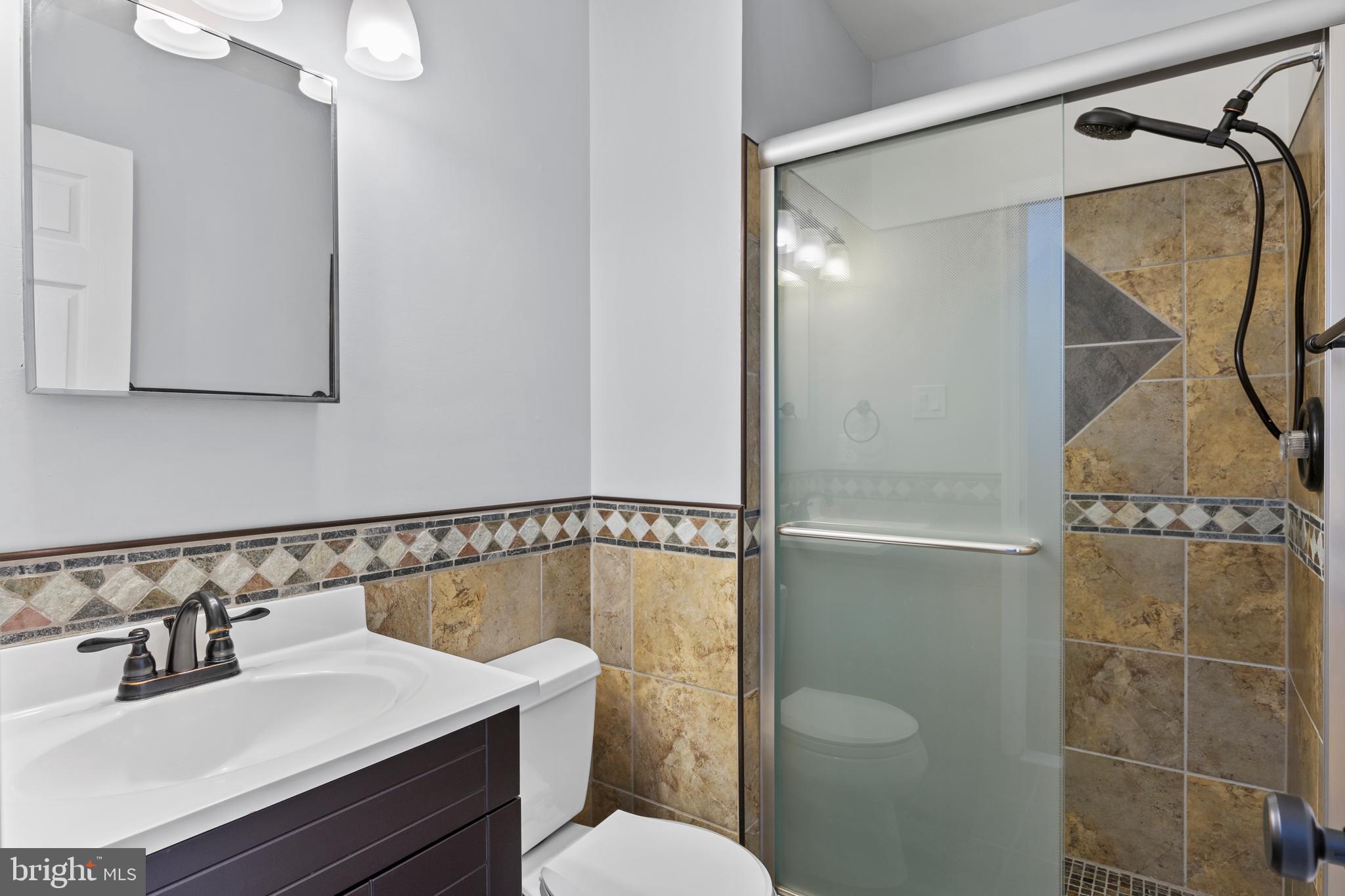 11019 Ring Road Reston, VA 20190 - Photo 43 of 78 a bathroom with a sink toilet and shower