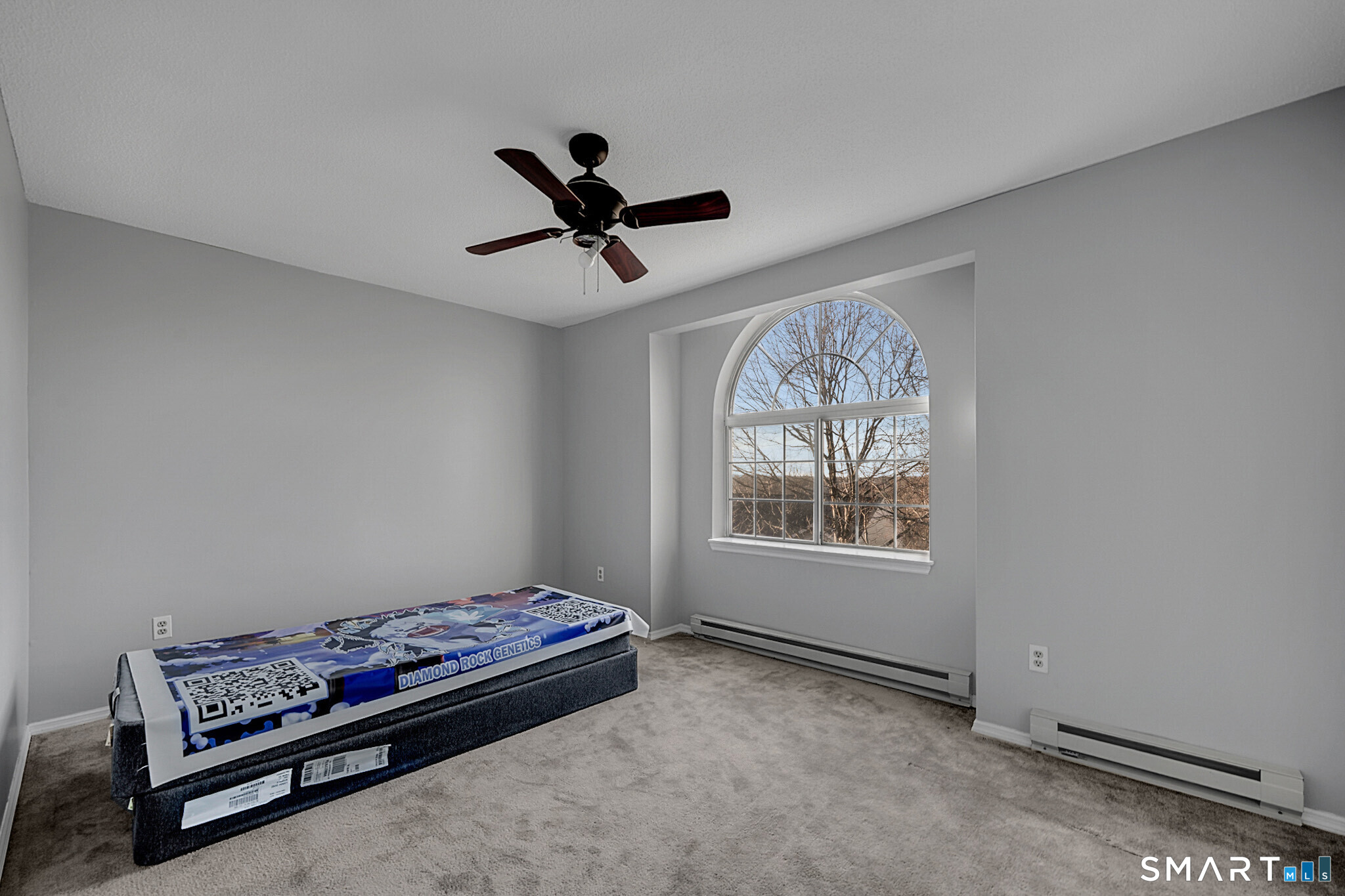 24 Blue Ridge Drive, Unit K12 Waterbury, CT 06704 - Photo 12 of 15 a living room with furniture and a window