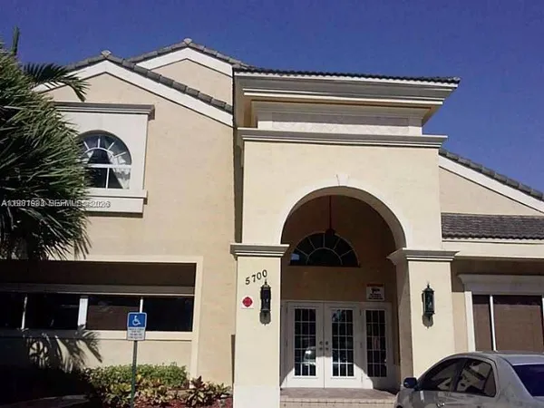 a view of a house with a balcony