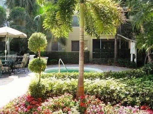 a house view with a garden space