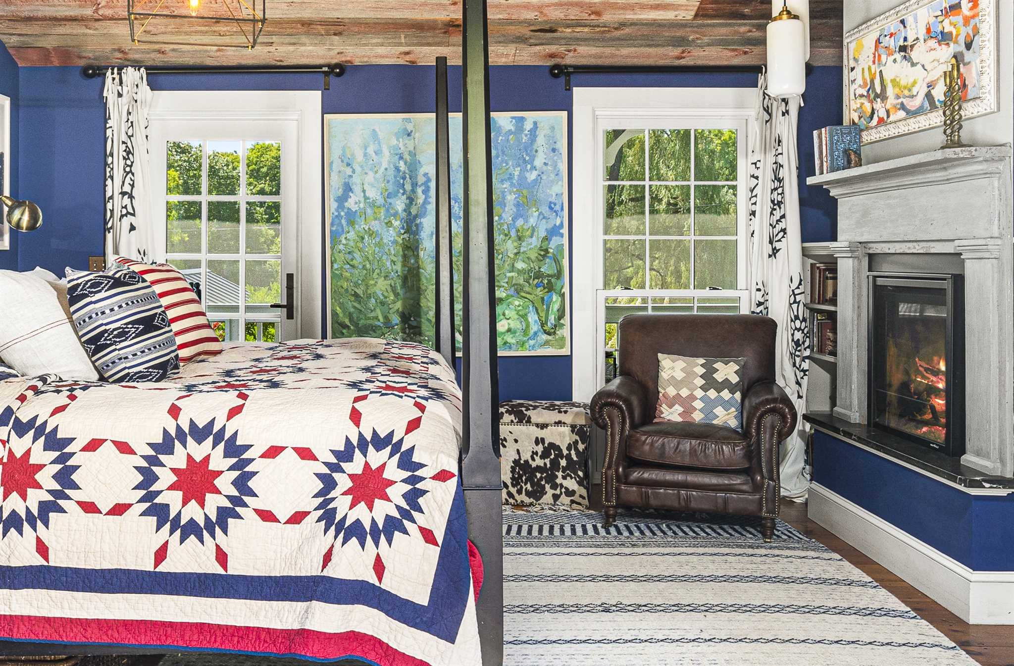 112 Malone Road Salt Point, NY 12578 - Photo 14 of 26 a bedroom with a bed and a fireplace