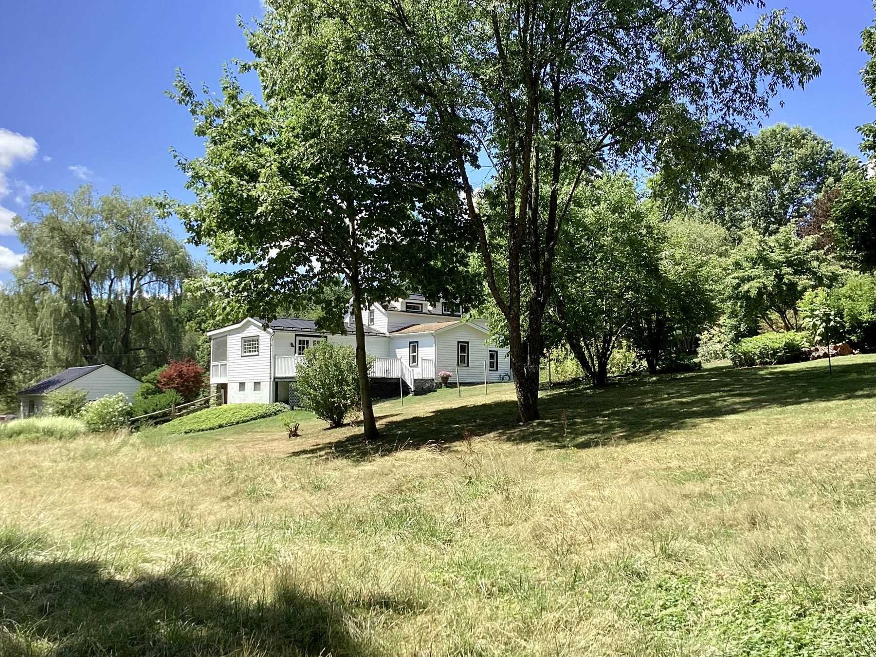 112 Malone Road Salt Point, NY 12578 - Photo 26 of 26 a house with trees in front of it