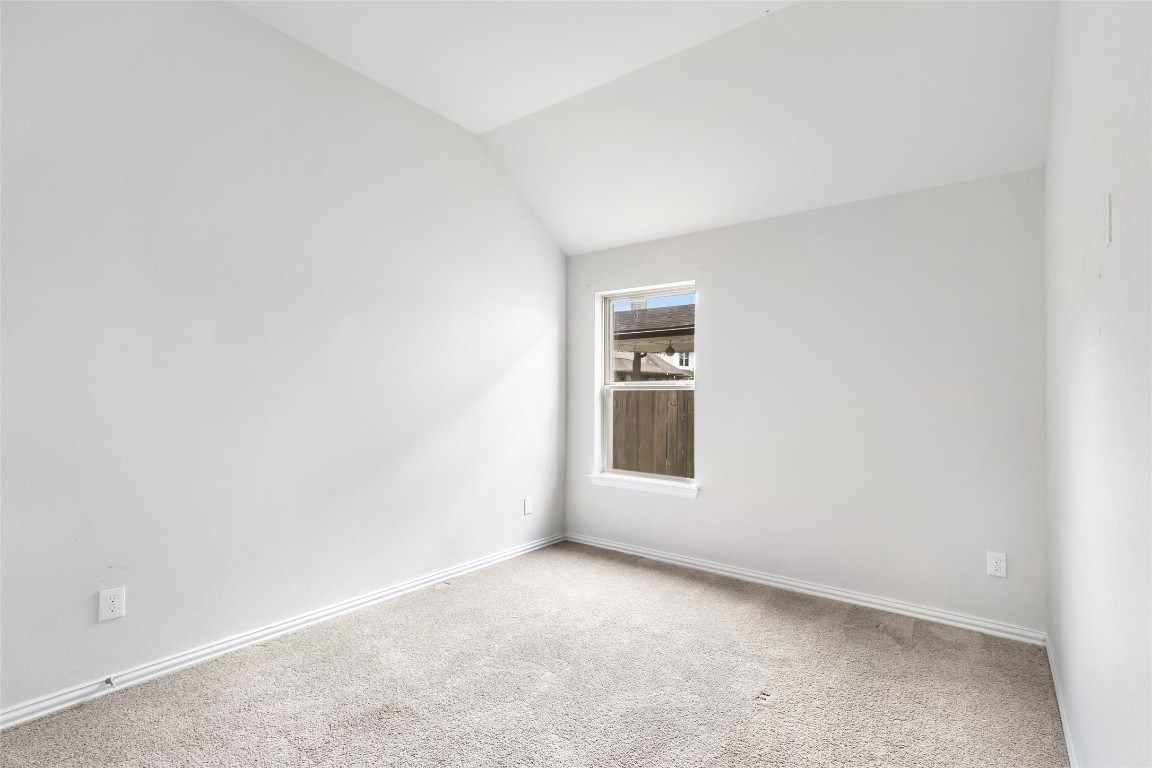 20811 Magical Merlin Way Tomball, TX 77375 - Photo 24 of 31 an empty room with a window