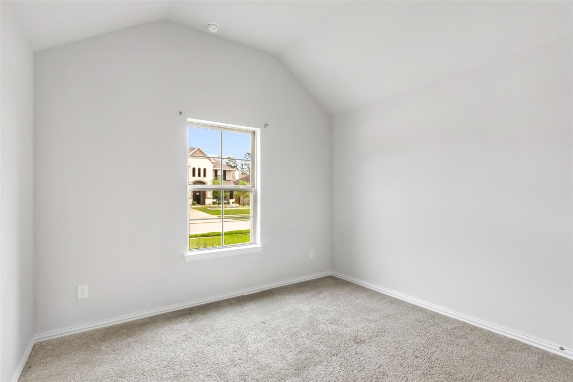 20811 Magical Merlin Way Tomball, TX 77375 - Photo 28 of 31 an empty room with window