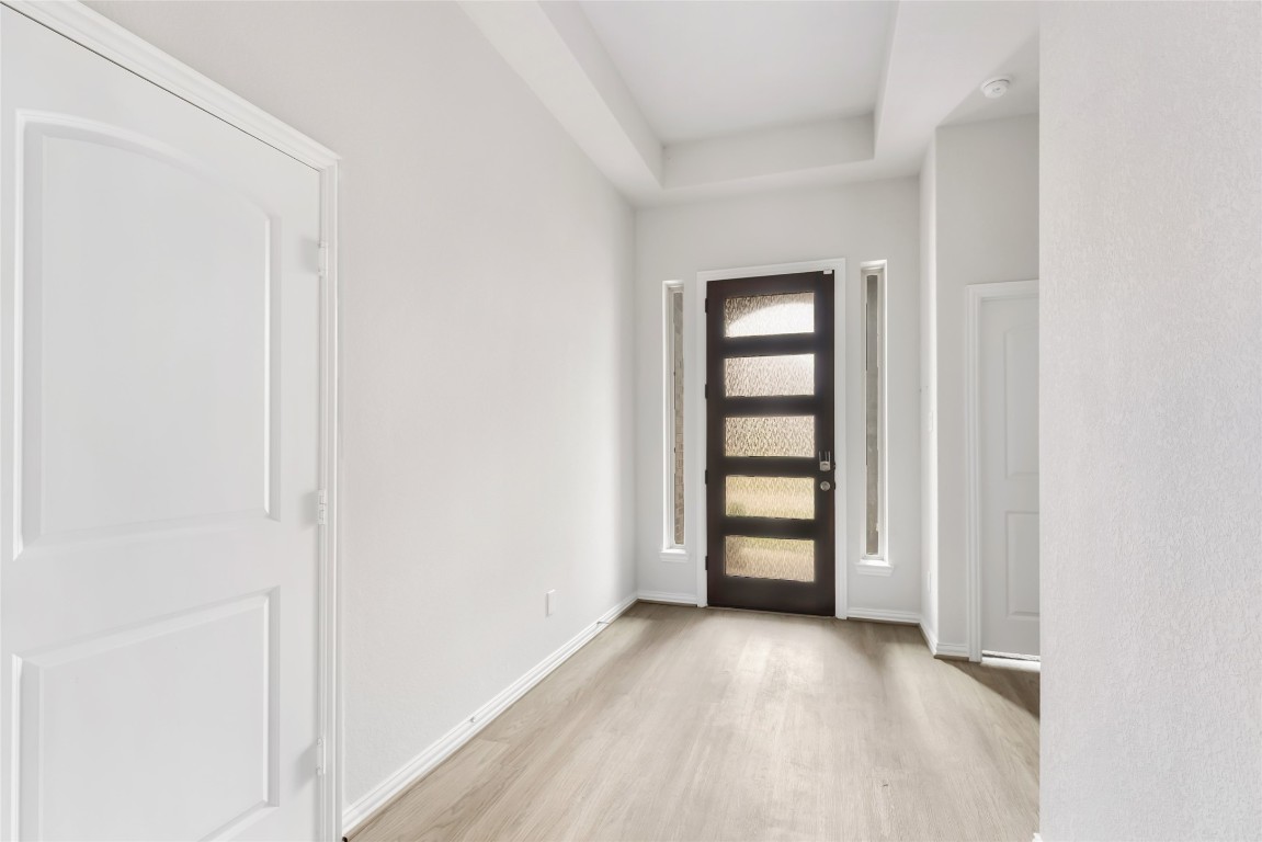 20811 Magical Merlin Way Tomball, TX 77375 - Photo 5 of 31 an empty room with windows and closet