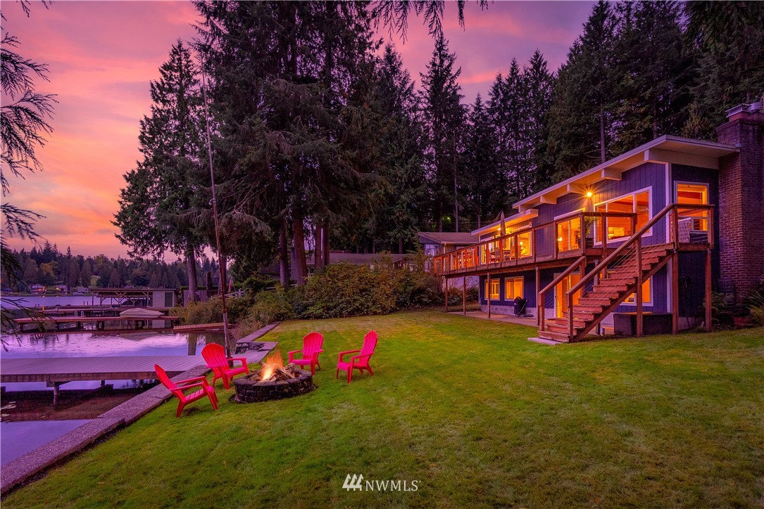 1817 Southwest Lake Roesiger Road Snohomish, WA 98290 - Photo 2 of 37 a view of yard with swimming pool and trees