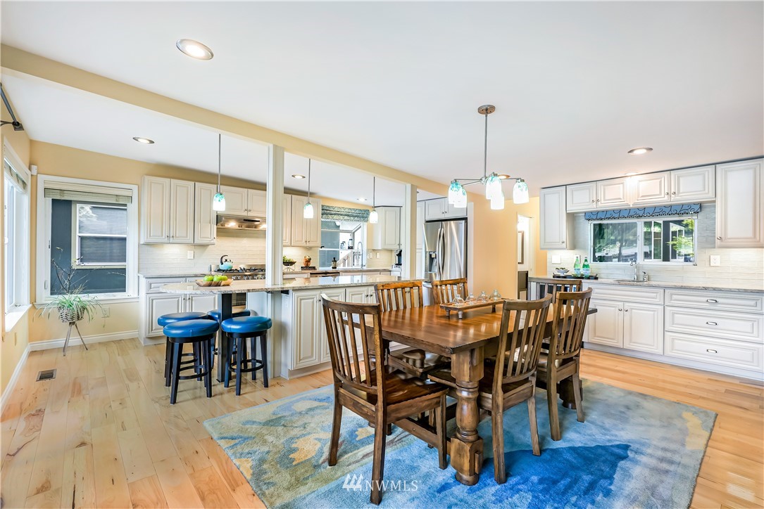 1817 Southwest Lake Roesiger Road Snohomish, WA 98290 - Photo 13 of 37 a dining room with furniture window and wooden floor
