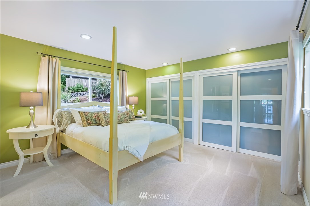 1817 Southwest Lake Roesiger Road Snohomish, WA 98290 - Photo 20 of 37 a bedroom with a bed and a window