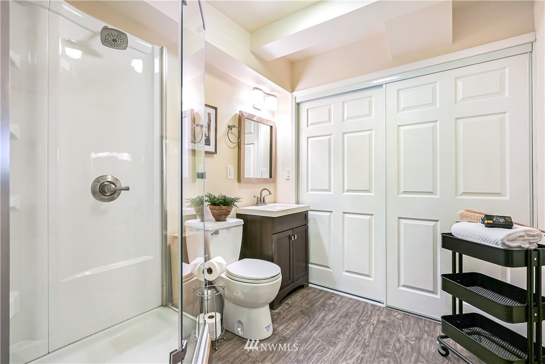 1817 Southwest Lake Roesiger Road Snohomish, WA 98290 - Photo 25 of 37 a bathroom with a toilet a bath tub and a shower