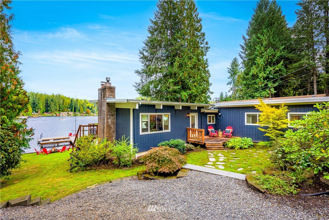 1817 Southwest Lake Roesiger Road Snohomish, WA 98290 - Photo 27 of 37 a front view of a house with garden