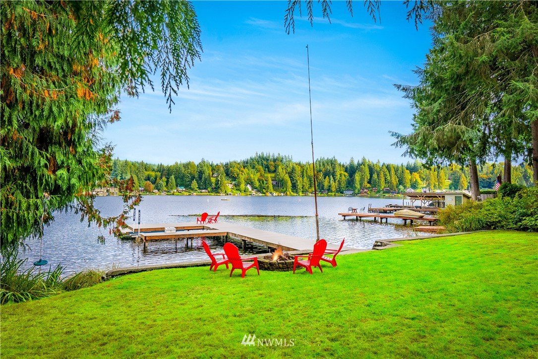 1817 Southwest Lake Roesiger Road Snohomish, WA 98290 - Photo 6 of 37 a view of a backyard with swimming pool