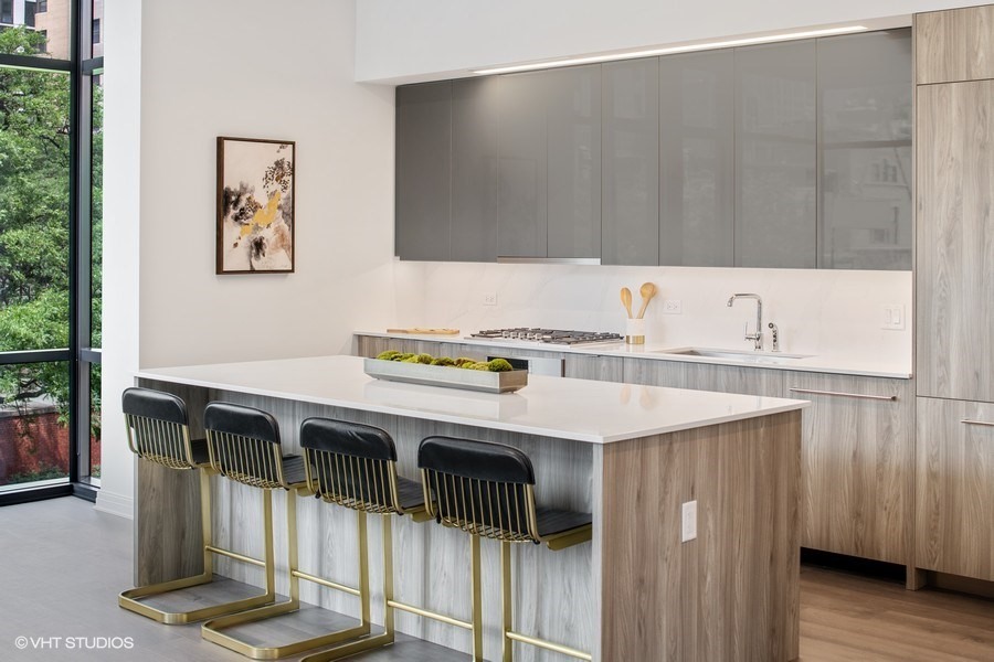 Undisclosed Address Chicago, IL 60610 - Photo 10 of 12 a kitchen with a sink a stove and a refrigerator
