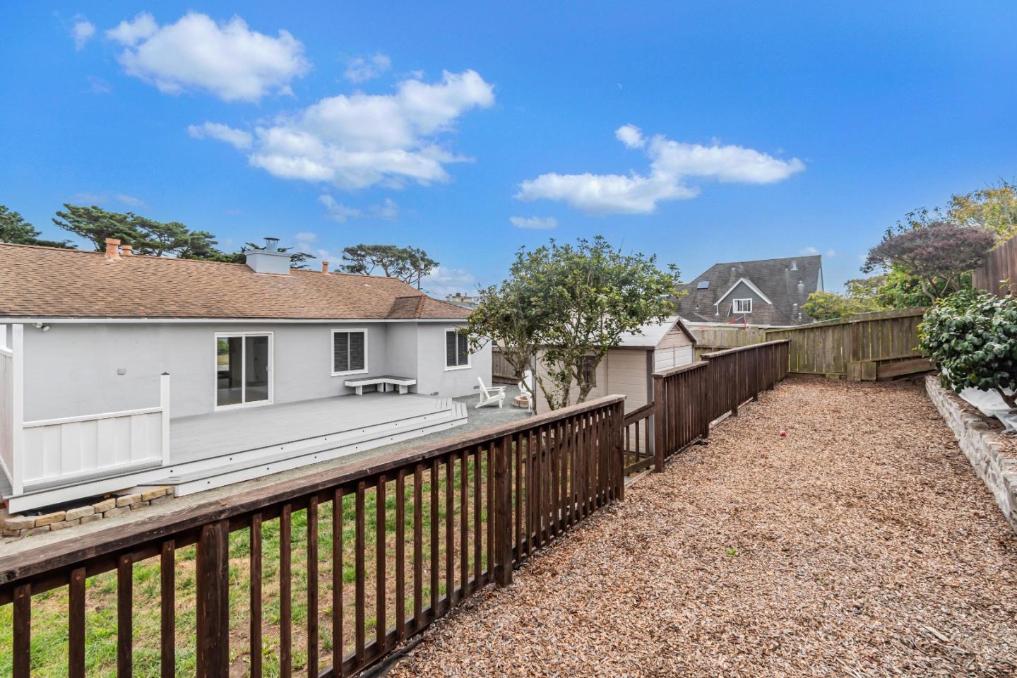 843 Beechwood Drive Daly City, CA 94015 - Photo 24 of 25 a view of a house with wooden fence
