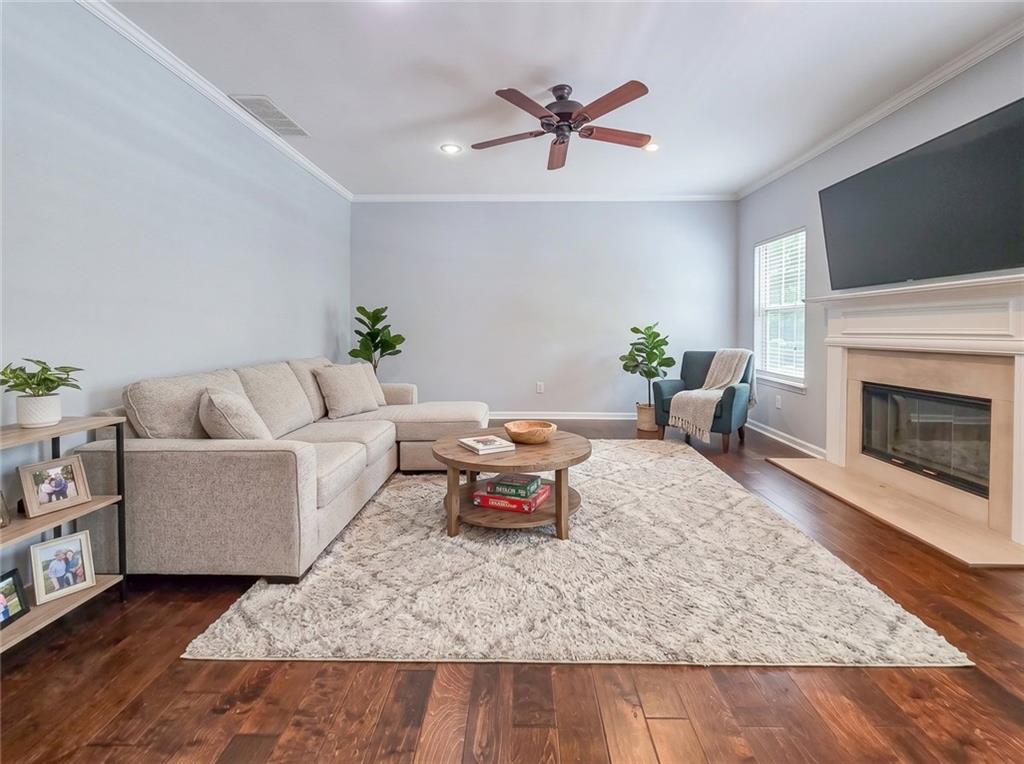 43 Ivy Mist Lane Acworth, GA 30101 - Photo 10 of 58 a living room with furniture and a fireplace