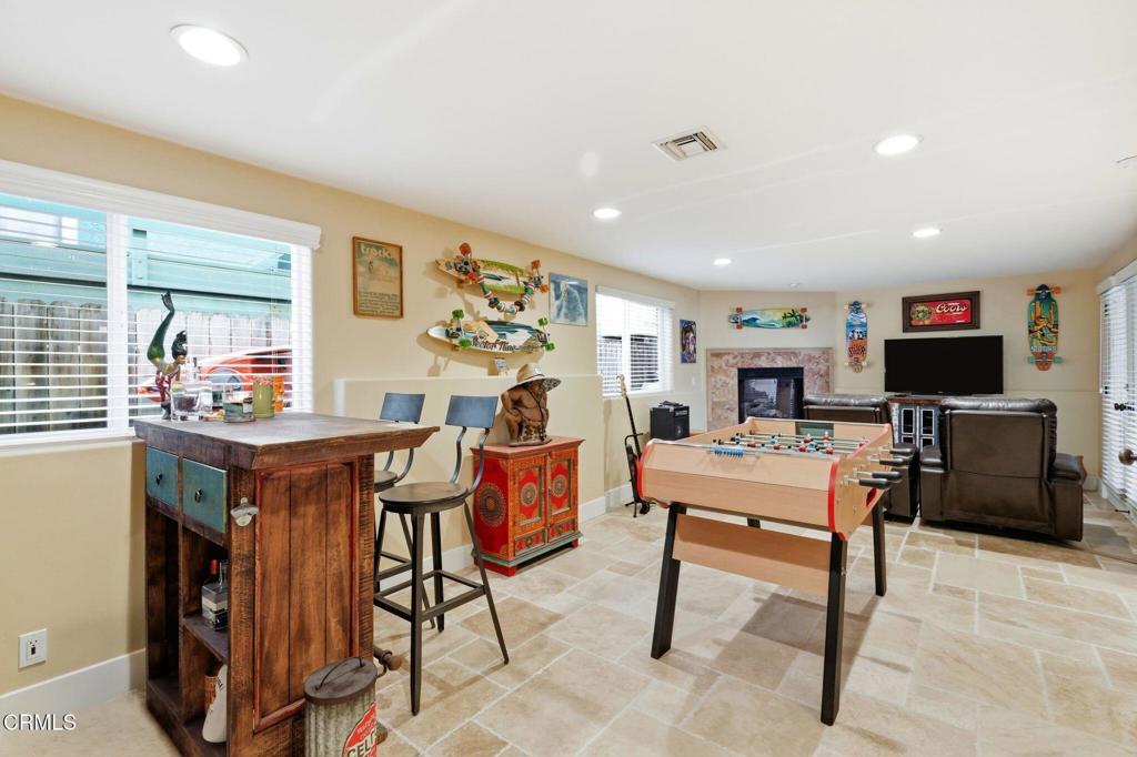 137 Fillmore Avenue Oxnard, CA 93035 - Photo 12 of 73 a living room with furniture and a flat screen tv