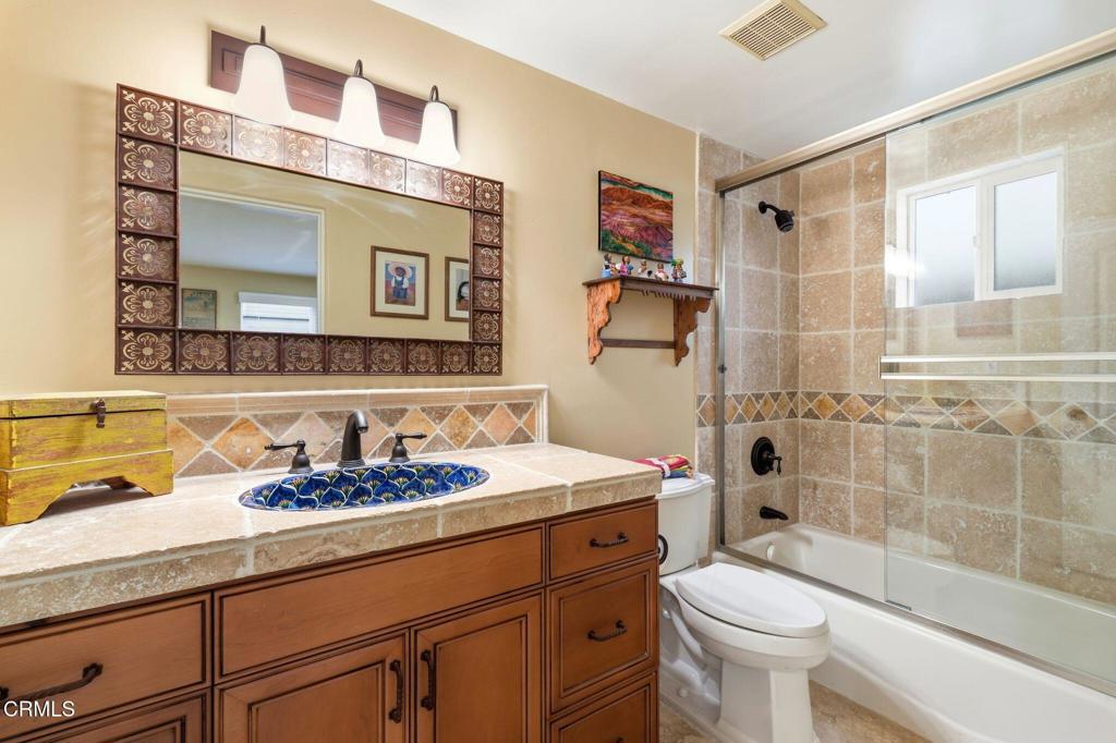 137 Fillmore Avenue Oxnard, CA 93035 - Photo 13 of 73 a bathroom with a sink toilet and shower