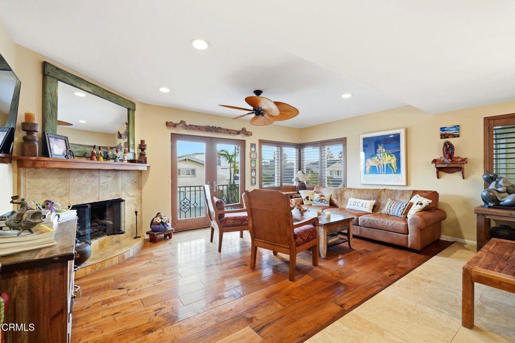 137 Fillmore Avenue Oxnard, CA 93035 - Photo 17 of 73 a living room with furniture fireplace and a large window