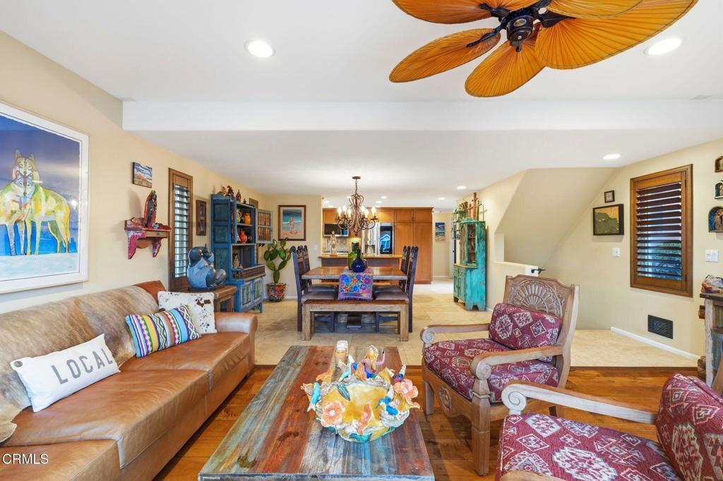 137 Fillmore Avenue Oxnard, CA 93035 - Photo 22 of 73 a living room with furniture and a chandelier