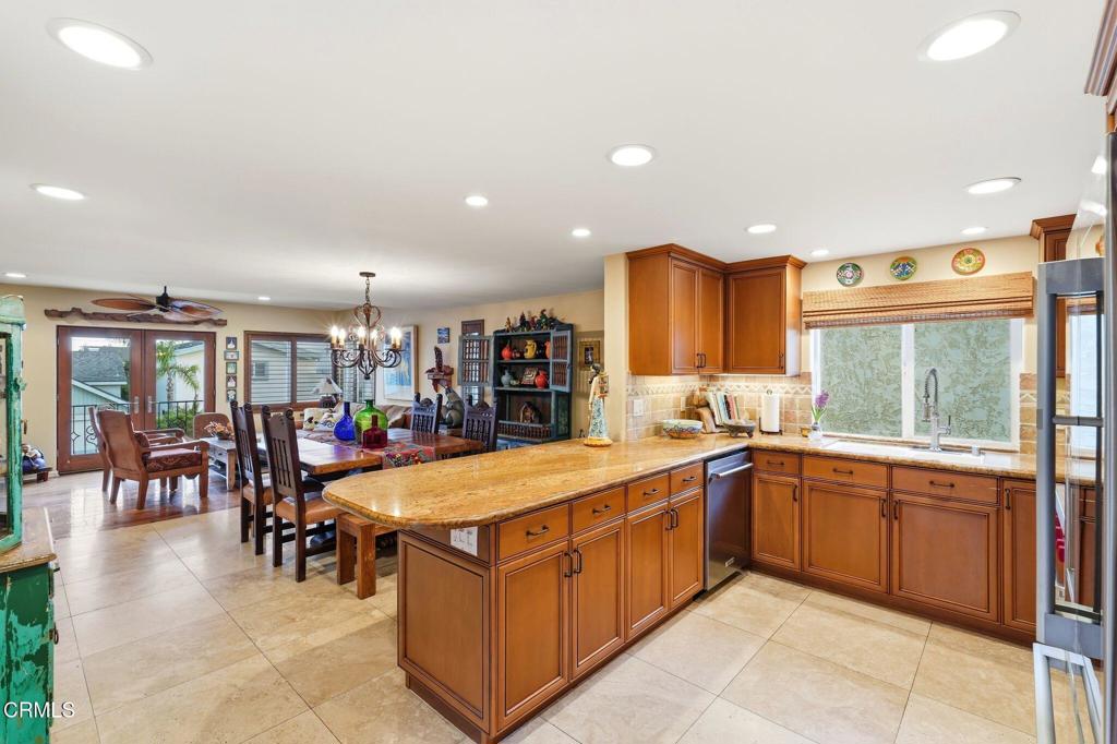 137 Fillmore Avenue Oxnard, CA 93035 - Photo 29 of 73 a large kitchen with lots of counter space and a sink